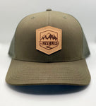 Leather Badge Life Trucker in Loden